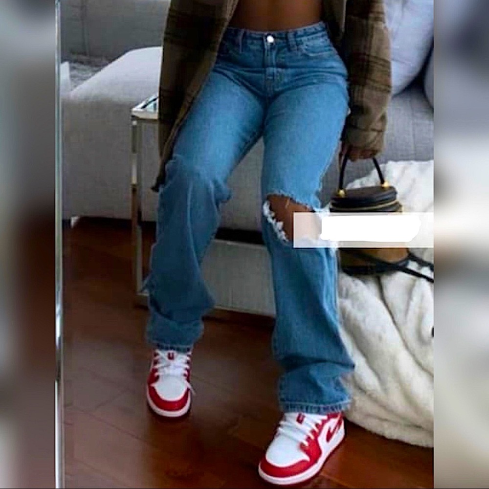 light blue open knee straight leg jeans